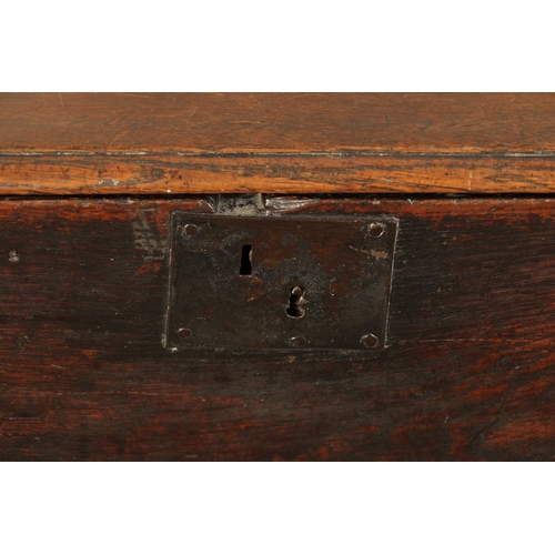 250 - AN EARLY 18TH CENTURY ELM AND OAK DOUGH BIN with lift off top; raised on a turned base. (122cm wide ... 