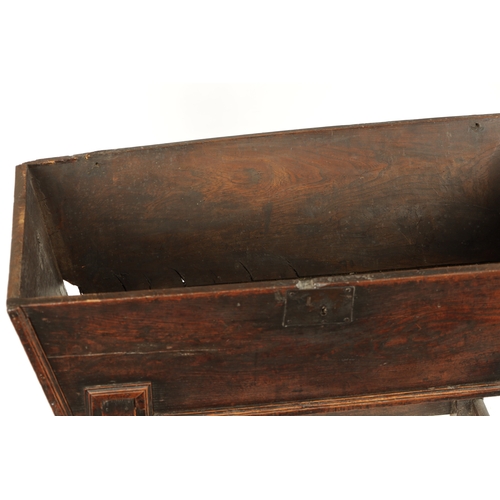 250 - AN EARLY 18TH CENTURY ELM AND OAK DOUGH BIN with lift off top; raised on a turned base. (122cm wide ... 