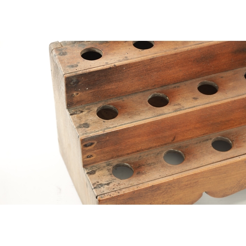 251 - AN 18TH CENTURY WELSH FRUITWOOD STEPPED SPOON RACK (28cm wide 24cm high)