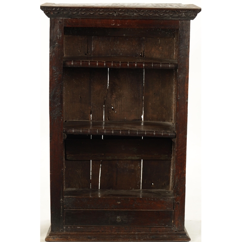 256 - A 17TH CENTURY OAK HANGING OPEN SPICE RACK WITH FITTED DRAWER (60cm wide 26cm deep 92cm high)