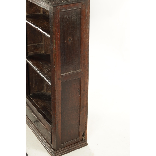 256 - A 17TH CENTURY OAK HANGING OPEN SPICE RACK WITH FITTED DRAWER (60cm wide 26cm deep 92cm high)