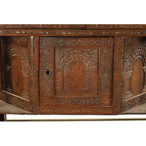 257 - A 17TH CENTURY CARVED OAK BUFFET with top drawer above an angled cupboard and open base. (119cm wide... 