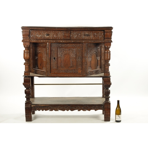 257 - A 17TH CENTURY CARVED OAK BUFFET with top drawer above an angled cupboard and open base. (119cm wide... 