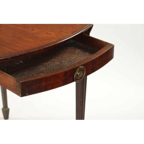 259 - AN GEORGE III OVAL MAHOGANY PEMBROKE TABLE on square moulded tapering legs (77cm wide 55cm deep 71cm... 