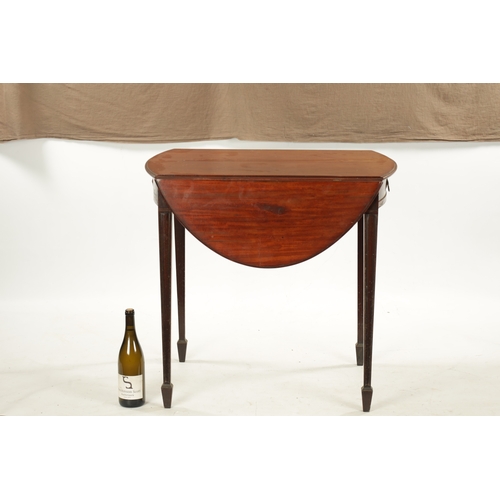 259 - AN GEORGE III OVAL MAHOGANY PEMBROKE TABLE on square moulded tapering legs (77cm wide 55cm deep 71cm... 