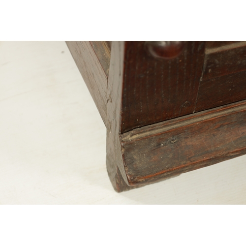 260 - A 17TH CENTURY JACOBEAN OAK LAUDIAN COFFER with moulded edge top above geometric moulded front. (127... 