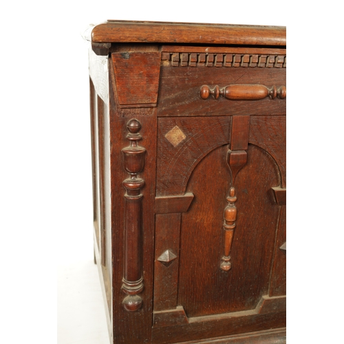 260 - A 17TH CENTURY JACOBEAN OAK LAUDIAN COFFER with moulded edge top above geometric moulded front. (127... 