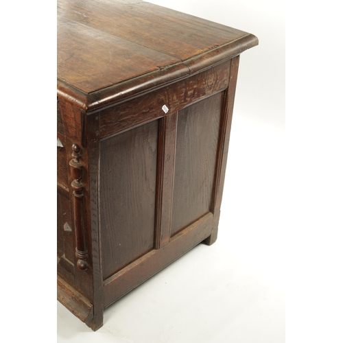 260 - A 17TH CENTURY JACOBEAN OAK LAUDIAN COFFER with moulded edge top above geometric moulded front. (127... 