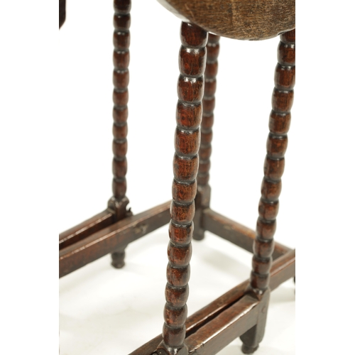 266 - A RARE CROMWELLIAN OAK DROP LEAF GATELEG TABLE OF SMALL SIZE raised on bobbin turned legs joined by ... 