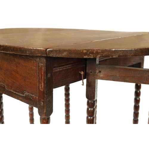 266 - A RARE CROMWELLIAN OAK DROP LEAF GATELEG TABLE OF SMALL SIZE raised on bobbin turned legs joined by ... 