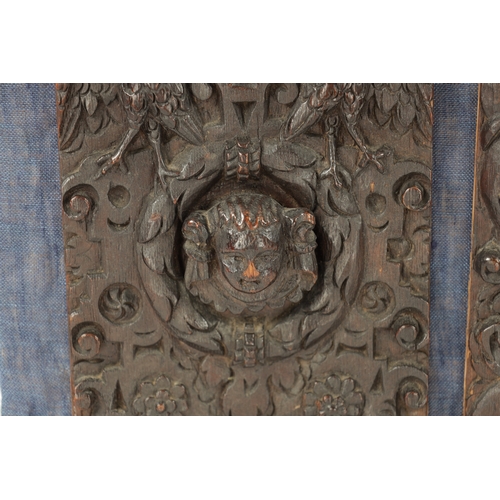 267 - TWO 17TH CENTURY CARVED OAK MASKED PANELS surrounded by animals (25cm 17cm and smaller)