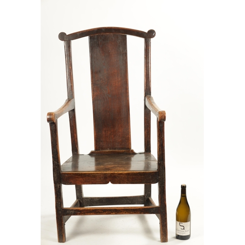 276 - AN 18TH CENTURY PRIMITIVE ASH AND ELM COUNTRY ARMCHAIR with solid shaped back splat and plank seat. ... 