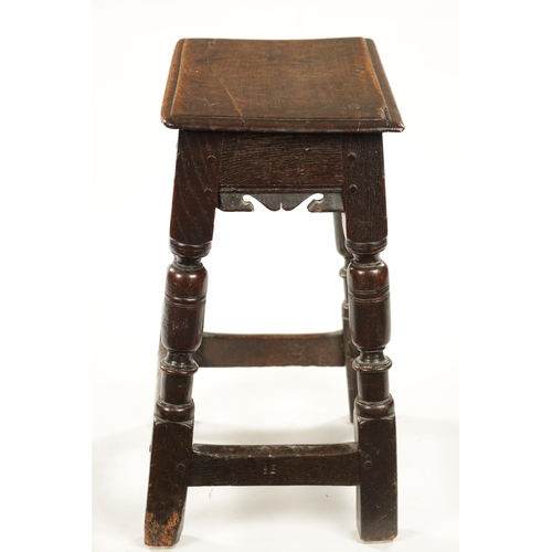 277 - A 17TH CENTURY OAK JOINT STOOL with pegged top raised on ring turned leg supports (47cm wide 27cm de... 