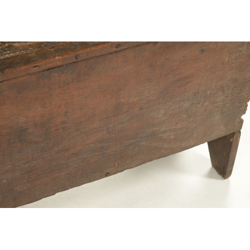 28 - A RARE 15TH/16TH CENTURY GOTHIC OAK PLANK COFFER OF SMALL SIZE with fret cut carved front (80cm wide... 