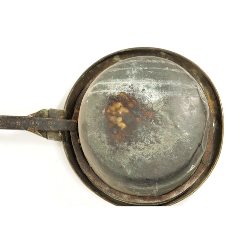 284 - A 17TH CENTURY BRASS WARMING PAN AND AN 18TH CENTURY BRASS PIERCED WARMING PAN one with an iron hand... 