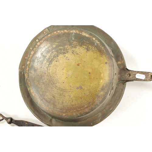 284 - A 17TH CENTURY BRASS WARMING PAN AND AN 18TH CENTURY BRASS PIERCED WARMING PAN one with an iron hand... 