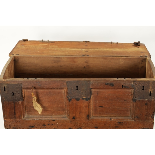 288 - A RARE 16TH / 17TH CENTURY OAK IRON BOUND STRONG BOX / PLANK COFFER with unusual triple lock panelle... 