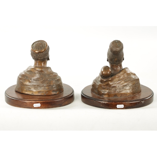 297 - A PAIR OF 20TH CENTURY BRONZE SCULPTURES DEPICTING A ZULU WOMEN AND MAN BY PIERRE VAN RYNEVELD SIGNE... 