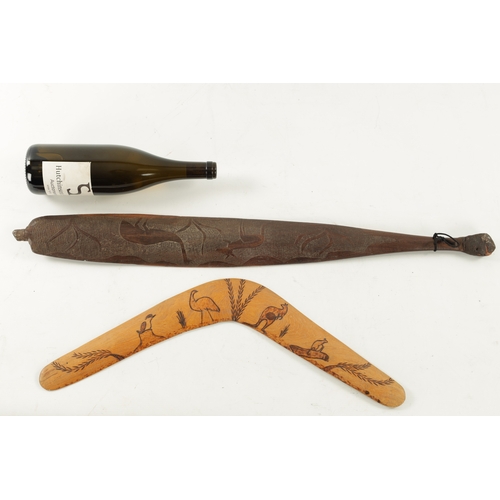 298 - AN ABORIGINAL MULGA WOOD SPEAR THROWER WITH CARVED ANIMALS AND AN OLD BOOMERANG. (76cm overall)