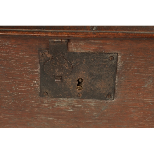 299 - AN 17TH CENTURY SLOPE TOP OAK BIBLE BOX with iron butterfly hinges and lock (59cm wide 42cm deep 27.... 