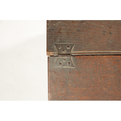 299 - AN 17TH CENTURY SLOPE TOP OAK BIBLE BOX with iron butterfly hinges and lock (59cm wide 42cm deep 27.... 