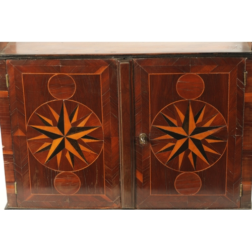 30 - A LATE 18TH CENTURY LABURNUM INLAID HANGING SHELVES with geometrically inlaid doors (53.5cm wide 16.... 