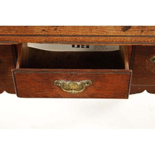 301 - A GOOD QUEEN ANNE OAK LOWBOY WITH DOUBLE REENTRANT CORNERED TOP having three frieze drawers joined b... 