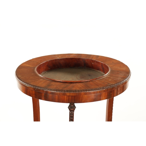 303 - A REGENCY TWO TIER MAHOGANY JARDINIERE STAND WITH BEADED DECORATION having two tiers and shaped trip... 