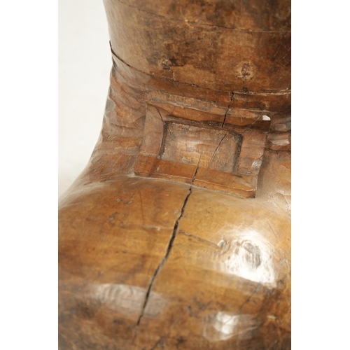 305 - A RARE 19TH CENTURY CARVED FRUITWOOD COBBLER’S ADVERTISING SIGN formed as a boot (68cm high 60cm dee... 