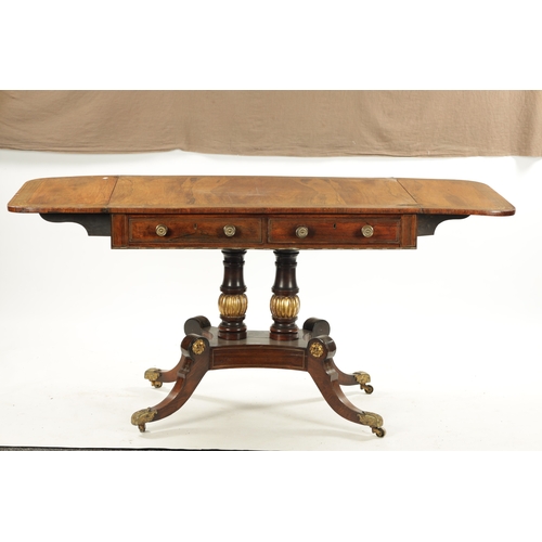 306 - A REGENCY FIGURED ROSEWOOD BRASS INLAID SOFA TABLE with fold down sides above frieze drawers; raised... 