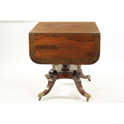 306 - A REGENCY FIGURED ROSEWOOD BRASS INLAID SOFA TABLE with fold down sides above frieze drawers; raised... 