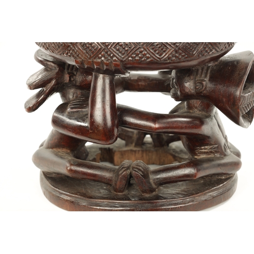 309 - A CARVED HARDWOOD LUBA DUAL DIVINATION LIDDED CUP from the Democratic Republic of Congo. (38cm high ... 