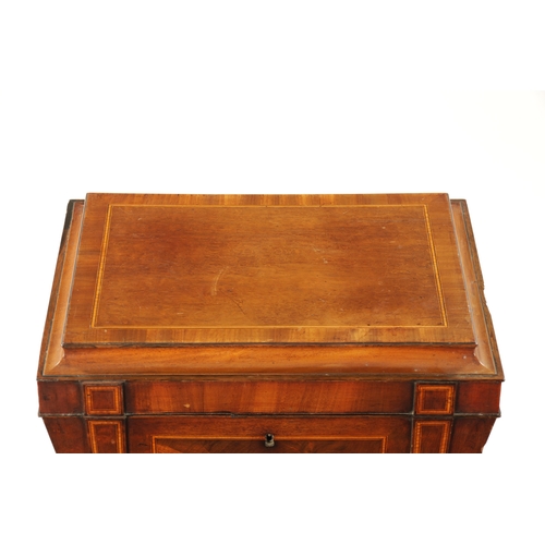 315 - A REGENCY INLAID MAHOGANY CELLARETTE ON TAPERED FLUTED LEGS IN THE MANNER OF GILLOWS with lion's hea... 