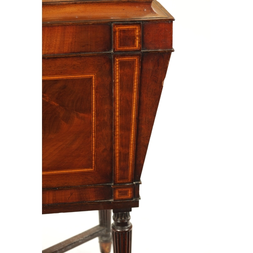 315 - A REGENCY INLAID MAHOGANY CELLARETTE ON TAPERED FLUTED LEGS IN THE MANNER OF GILLOWS with lion's hea... 