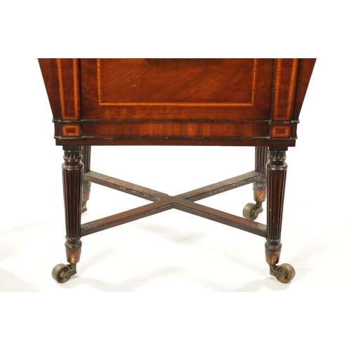 315 - A REGENCY INLAID MAHOGANY CELLARETTE ON TAPERED FLUTED LEGS IN THE MANNER OF GILLOWS with lion's hea... 