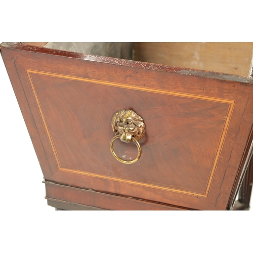 315 - A REGENCY INLAID MAHOGANY CELLARETTE ON TAPERED FLUTED LEGS IN THE MANNER OF GILLOWS with lion's hea... 