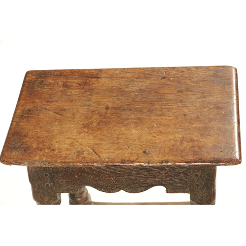 318 - A 17TH CENTURY OAK JOINT STOOL with pegged top above a ring turned base joined by stretchers (46cm w... 