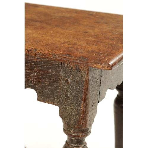 318 - A 17TH CENTURY OAK JOINT STOOL with pegged top above a ring turned base joined by stretchers (46cm w... 