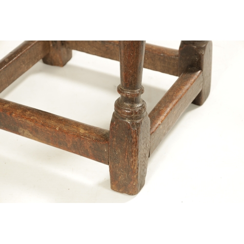 318 - A 17TH CENTURY OAK JOINT STOOL with pegged top above a ring turned base joined by stretchers (46cm w... 