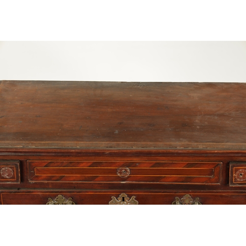 321 - AN 18TH CENTURY FIGURED MAHOGANY CHEST OF DRAWERS with unusual drawer lay out having three inlaid fr... 