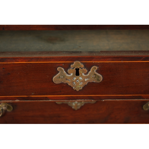 321 - AN 18TH CENTURY FIGURED MAHOGANY CHEST OF DRAWERS with unusual drawer lay out having three inlaid fr... 