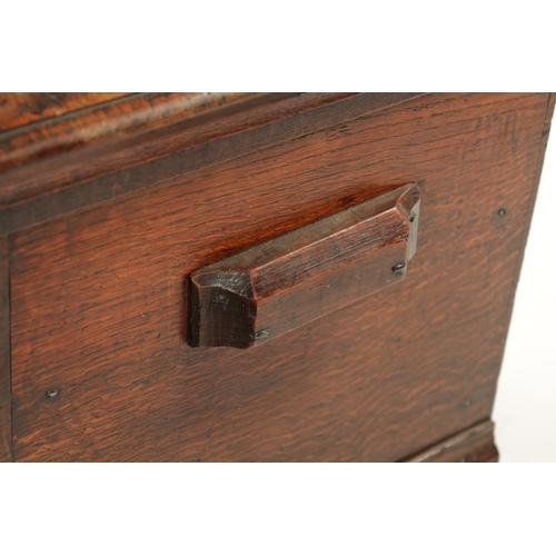 324 - A QUEEN ANNE OAK BOX STOOL with hinged top and moulded front (55cm wide 46cm deep 47cm high)