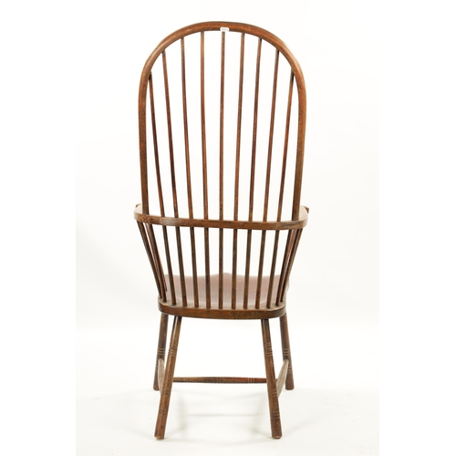 327 - A 19TH CENTURY PRIMITIVE PAINTED STICK BACK WINDSOR ARMCHAIR having an unusual high back raised on r... 