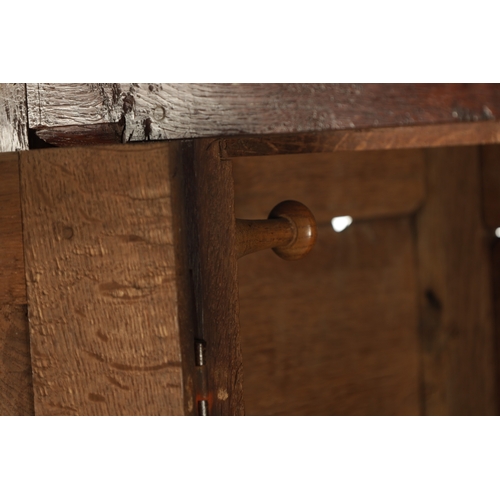 33 - A SMALL EARLY 18TH CENTURY OAK PANELLED CUPBOARD with ironwork H hinges (92cm wide 46cm deep 159cm h... 