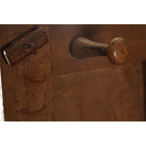 33 - A SMALL EARLY 18TH CENTURY OAK PANELLED CUPBOARD with ironwork H hinges (92cm wide 46cm deep 159cm h... 