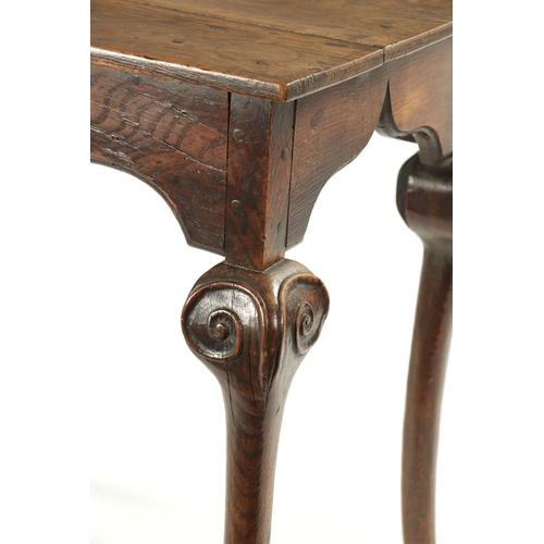 330 - AN UNUSUAL PRIMITIVE QUEEN ANNE CARVED OAK CABRIOLE LEG RECTANGULAR HALL TABLE with bold scroll carv... 