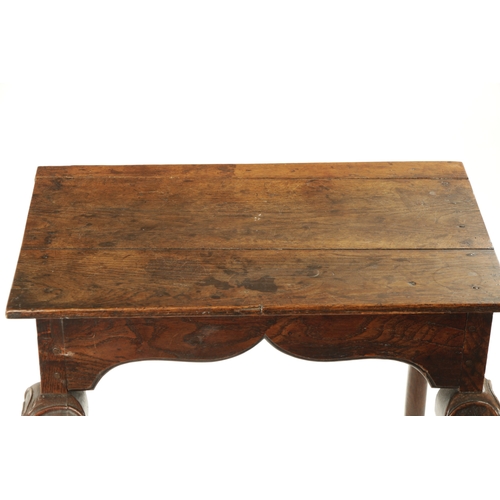 330 - AN UNUSUAL PRIMITIVE QUEEN ANNE CARVED OAK CABRIOLE LEG RECTANGULAR HALL TABLE with bold scroll carv... 