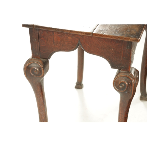 330 - AN UNUSUAL PRIMITIVE QUEEN ANNE CARVED OAK CABRIOLE LEG RECTANGULAR HALL TABLE with bold scroll carv... 