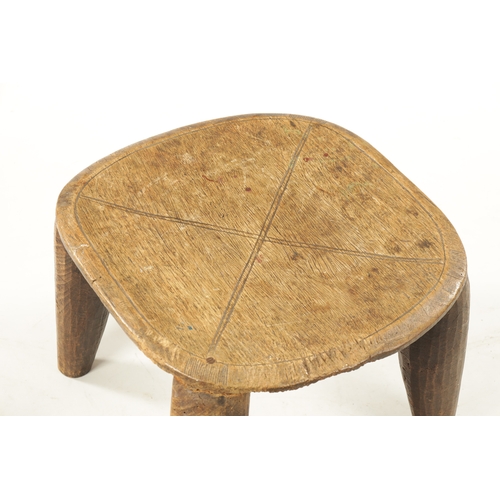 332 - AN ANTIQUE NATIVE HARDWOOD FOUR-LEG STOOL (55cm wide 49cm deep 33cm high)