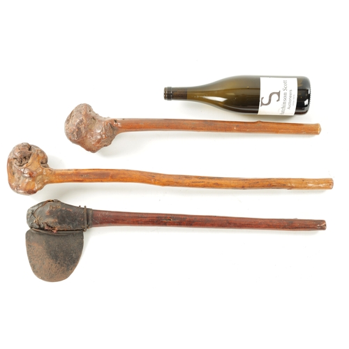 333 - A SELECTION OF THREE AFRICAN CLUBS comprising of two knobkerries and a adze (66cm overall and smalle... 